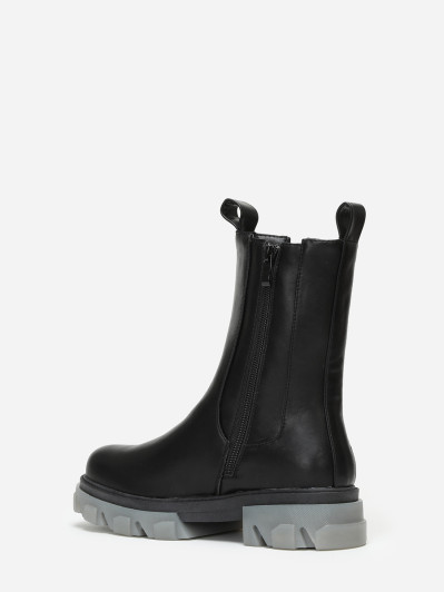 Chelsea noires avec semelle à effet translucide