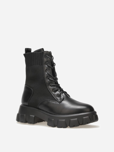 Rangers noires bi-matières à plateforme crantée