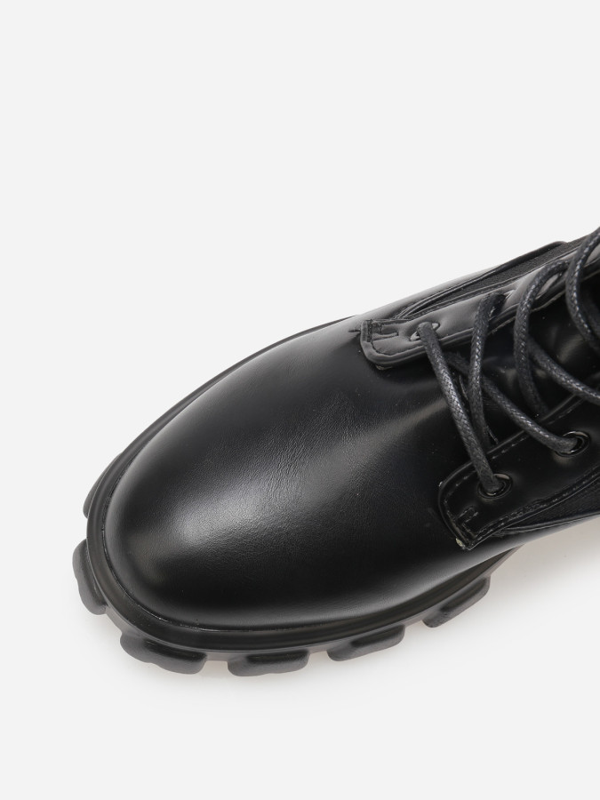 Rangers noires bi-matières à plateforme crantée