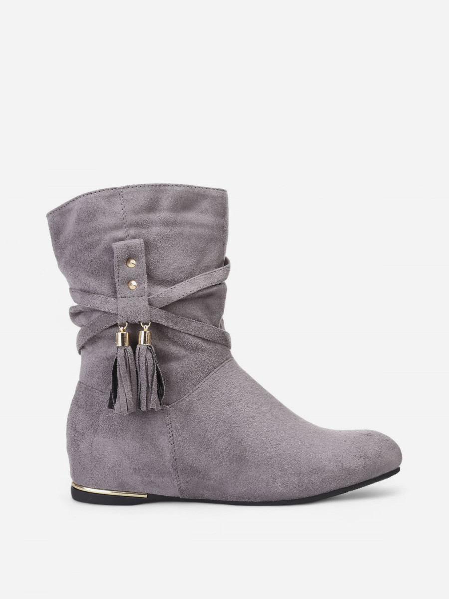 Bottines plissées et compensées à pampilles