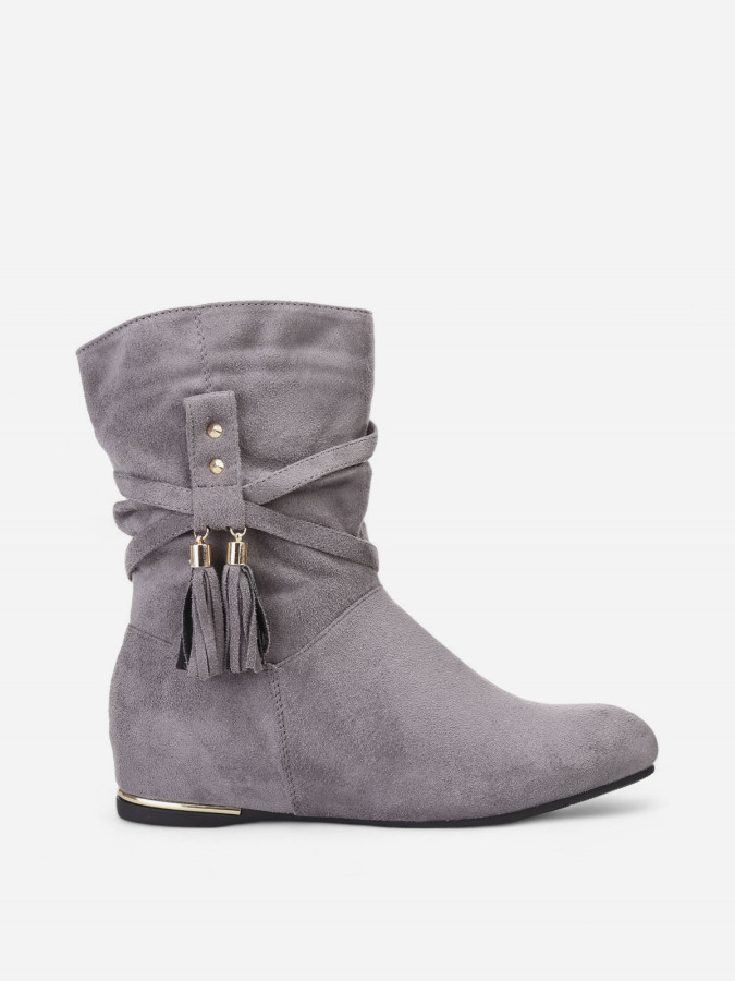 Bottines plissées et compensées à pampilles