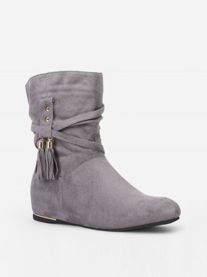 Bottines plissées et compensées à pampilles