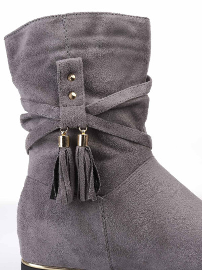 Bottines plissées et compensées à pampilles