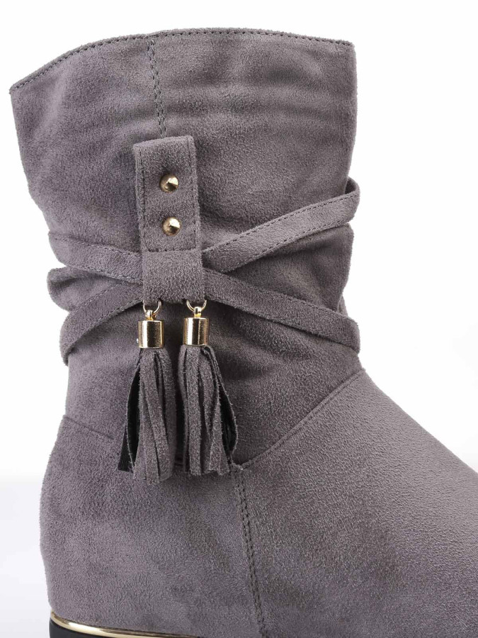 Bottines plissées et compensées à pampilles