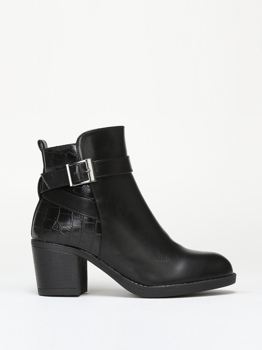 Bottines bi-matières avec bride à boucle