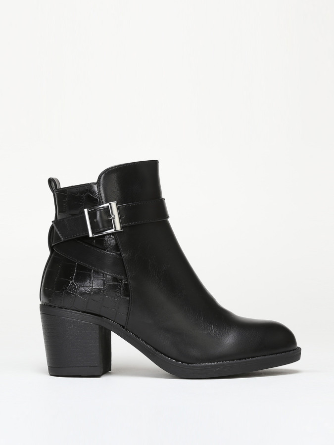 Bottines bi-matières avec bride à boucle