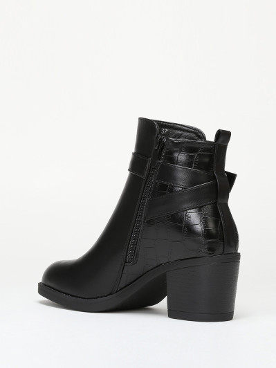 Bottines bi-matières avec bride à boucle