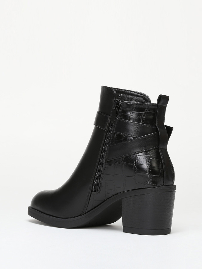 Bottines bi-matières avec bride à boucle