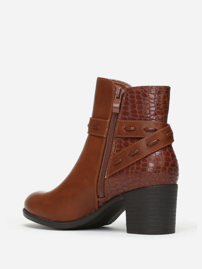 Bottines bi-matières avec bride à boucle