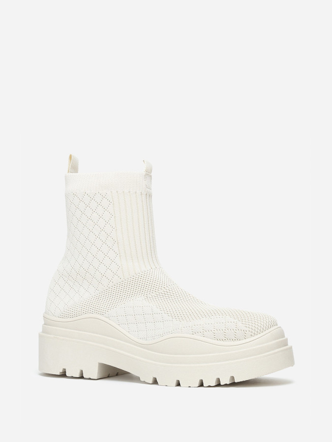 Bottines chaussettes beiges crantées