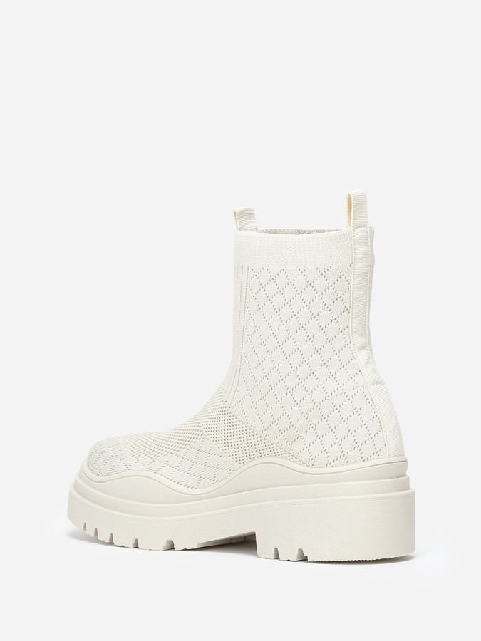 Bottines chaussettes beiges crantées